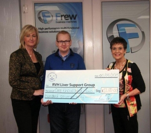 Founder Kay Duffy receives the cheque from Gloria and Daniel Fletcher