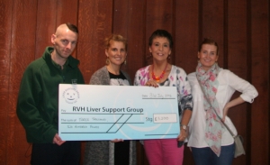 Kay Duffy receives the cheque on behalf of the support group
