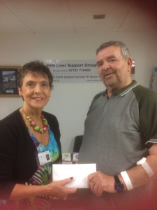 Paul Kearney makes his presentation to Kay Duffy, founder of RVH Liver Support Group