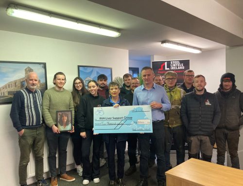 Barney McConville of Steel Lintels Ireland Ltd presents cheque to Kay Duffy.